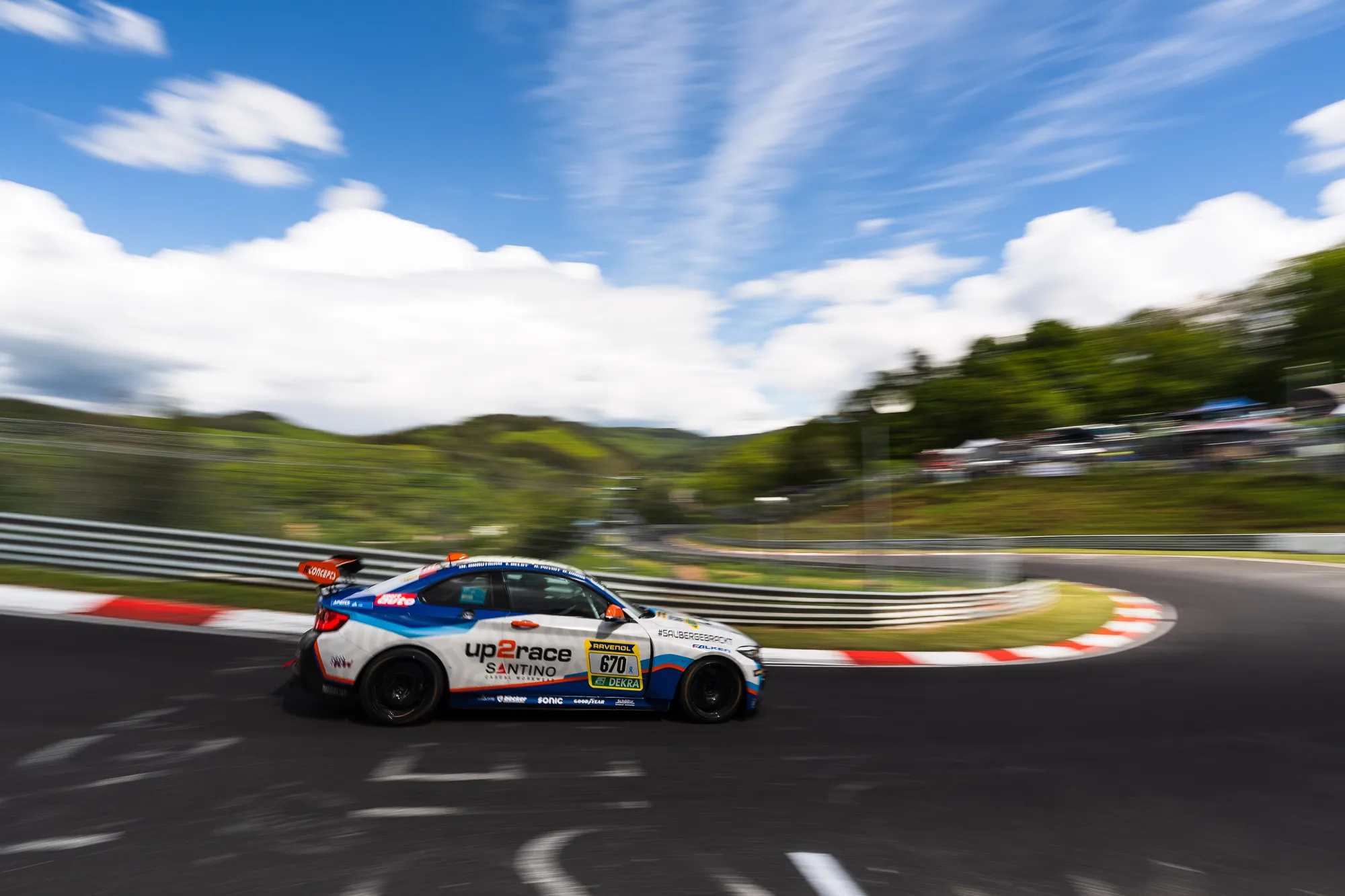 White BMW M240i Racing on track at the Nürburgring