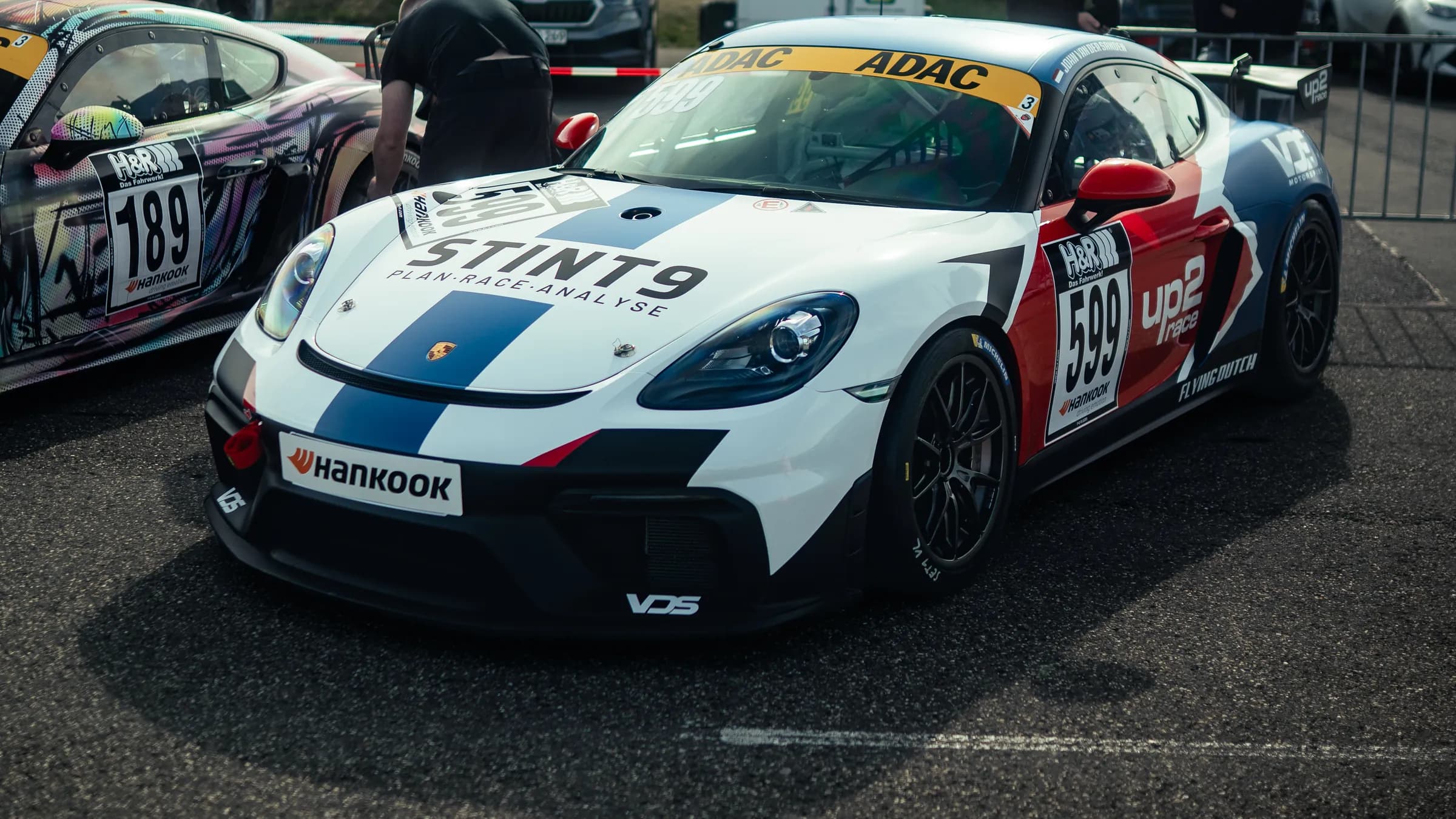 The Porsche 718 Cayman GT4 Clubsport in VDS Motorsport colours in the paddock