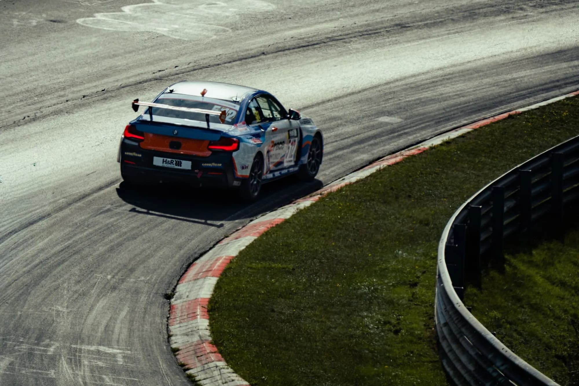 Our BMW M240i Racing in a corner of the Nordschleife at RCN 7