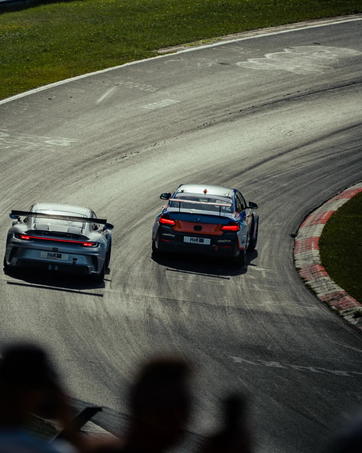 The M240i side by side with a Porsche during RCN 7